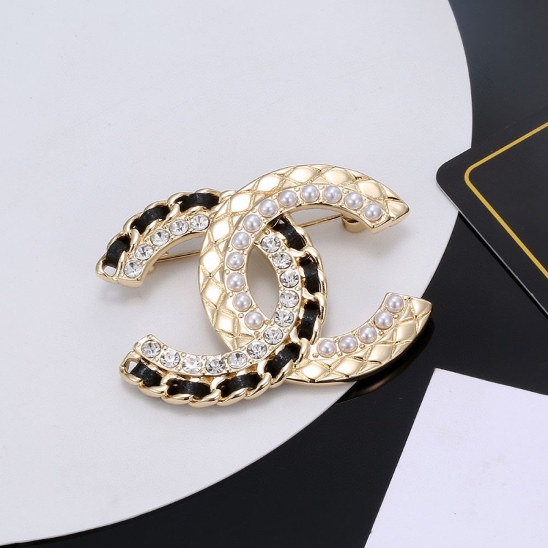 Ch*el brooches